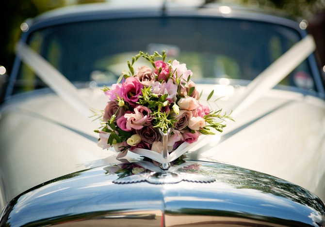 wedding car inspiration decor flowers and ribbon. Wedding by Tara Aherne Photography flower decor on wedding car ribbon